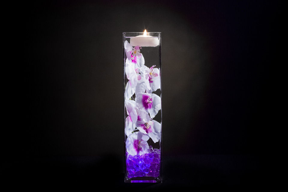 Violet Centerpiece with Flowers and Floating Candles