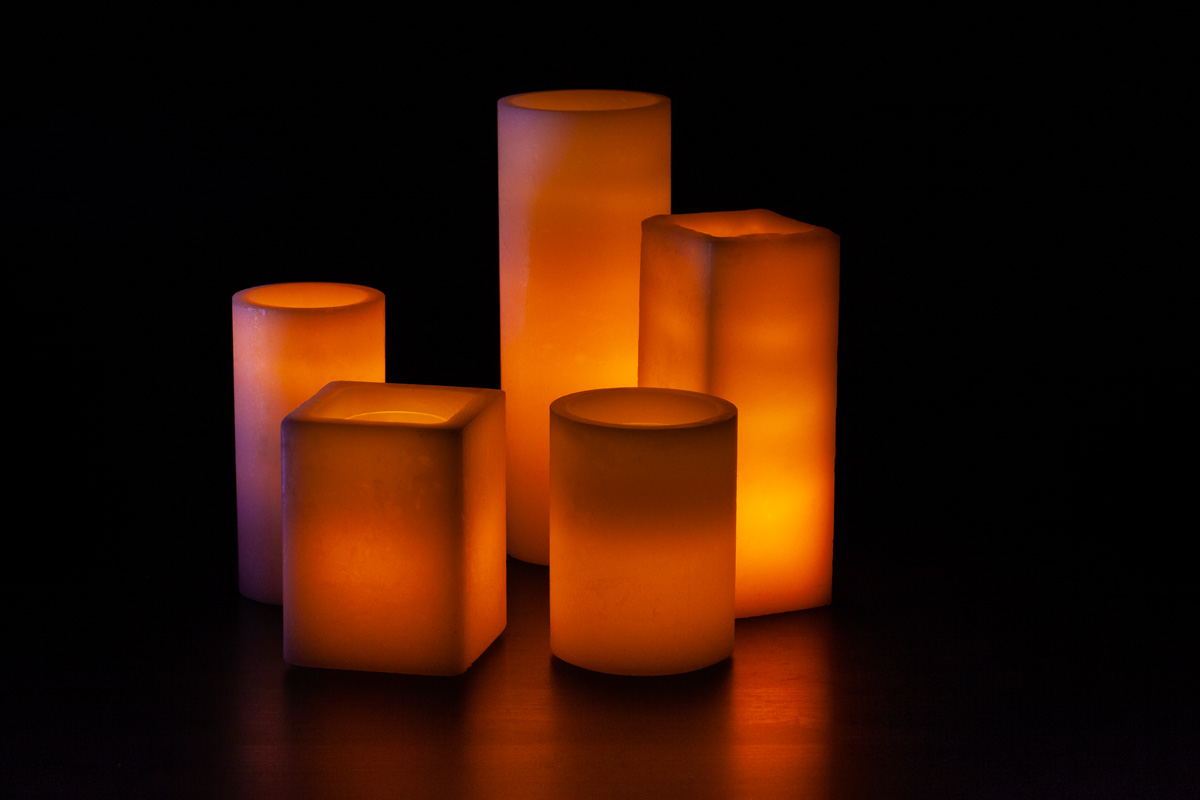 An Orange Themed Wax Luminary Display