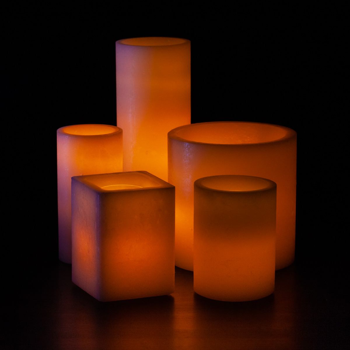 An Orange Themed Wax Luminary Display