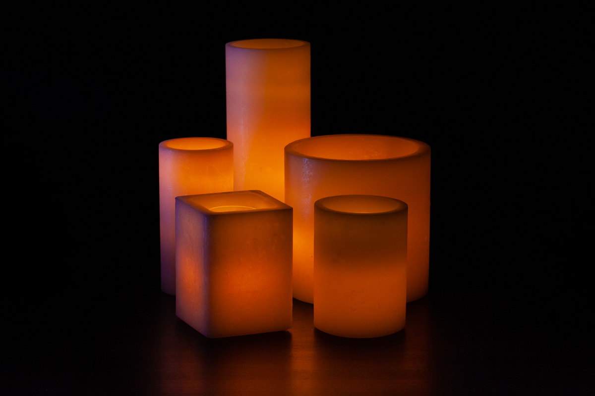 An Orange Themed Wax Luminary Display