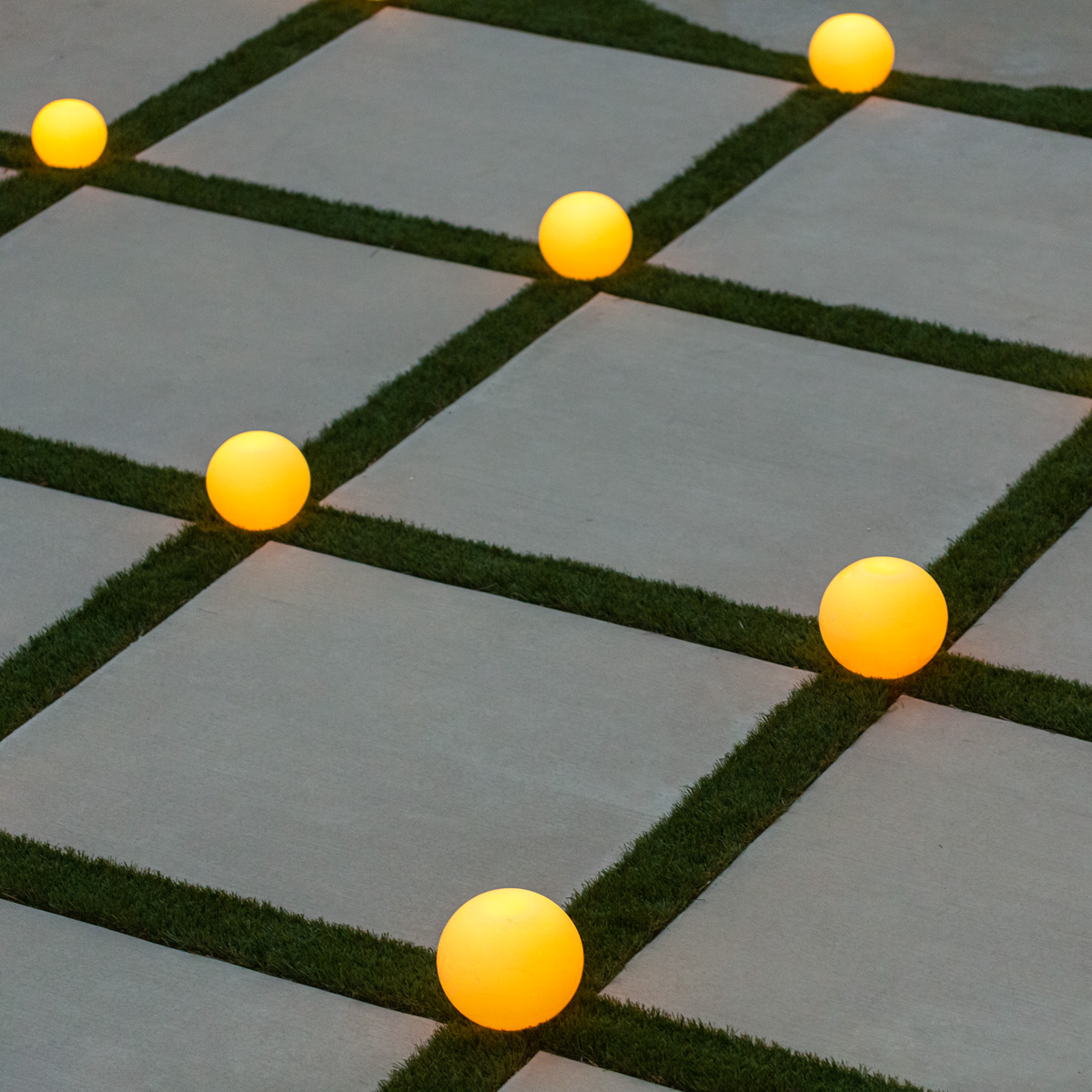 Illuminated Balls and Spheres as Accents for Garden and Walkways