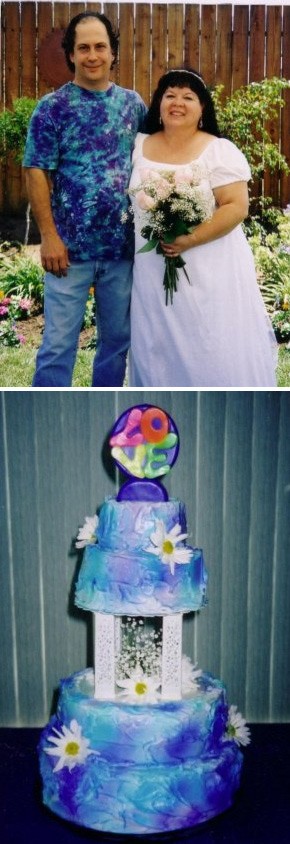 Just wanted to show you guys a picture of the tie-dyed cake for my Groovy Hippie Wedding. I used your Retro LOVE candle as a topper, and got jillions of compliments! We chose a hippie theme for our we