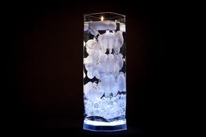 White Floral Centerpiece with LED Lights and Floating Candles