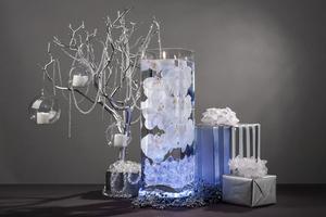 White Floral Centerpiece with LED Lights and Floating Candles