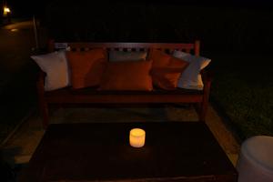 TOI Event Lounge Area with Wax Luminary Candle