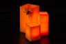 Spooky Orange Wax Luminary Display