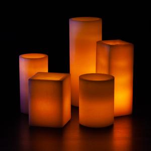An Orange Themed Wax Luminary Display