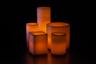 An Orange Themed Wax Luminary Display